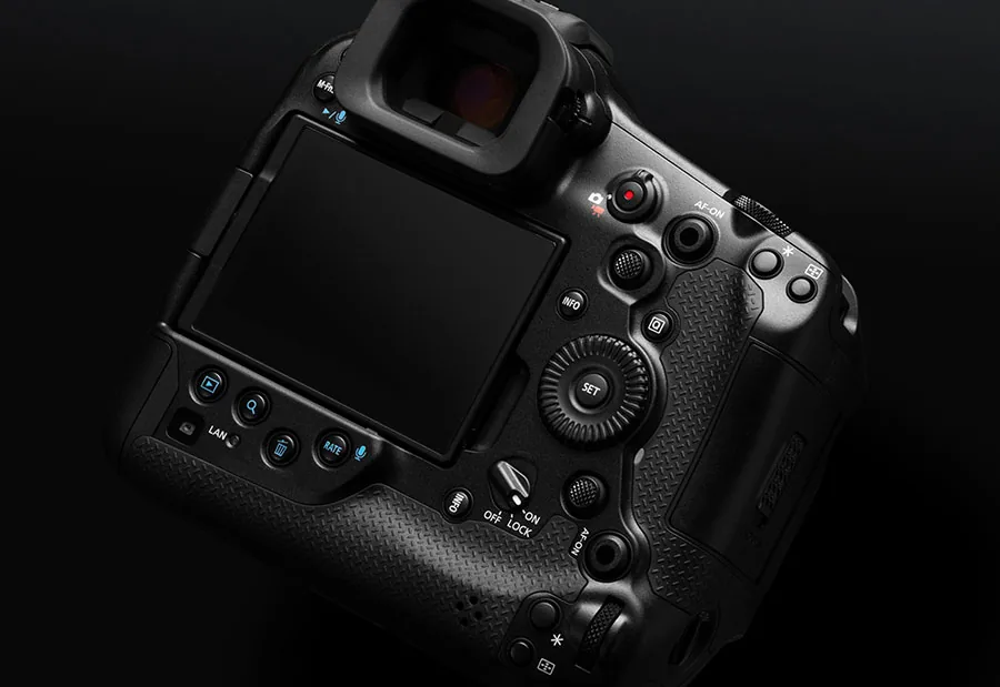 Rear controls and display of the Canon EOS R1 in an official studio photograph