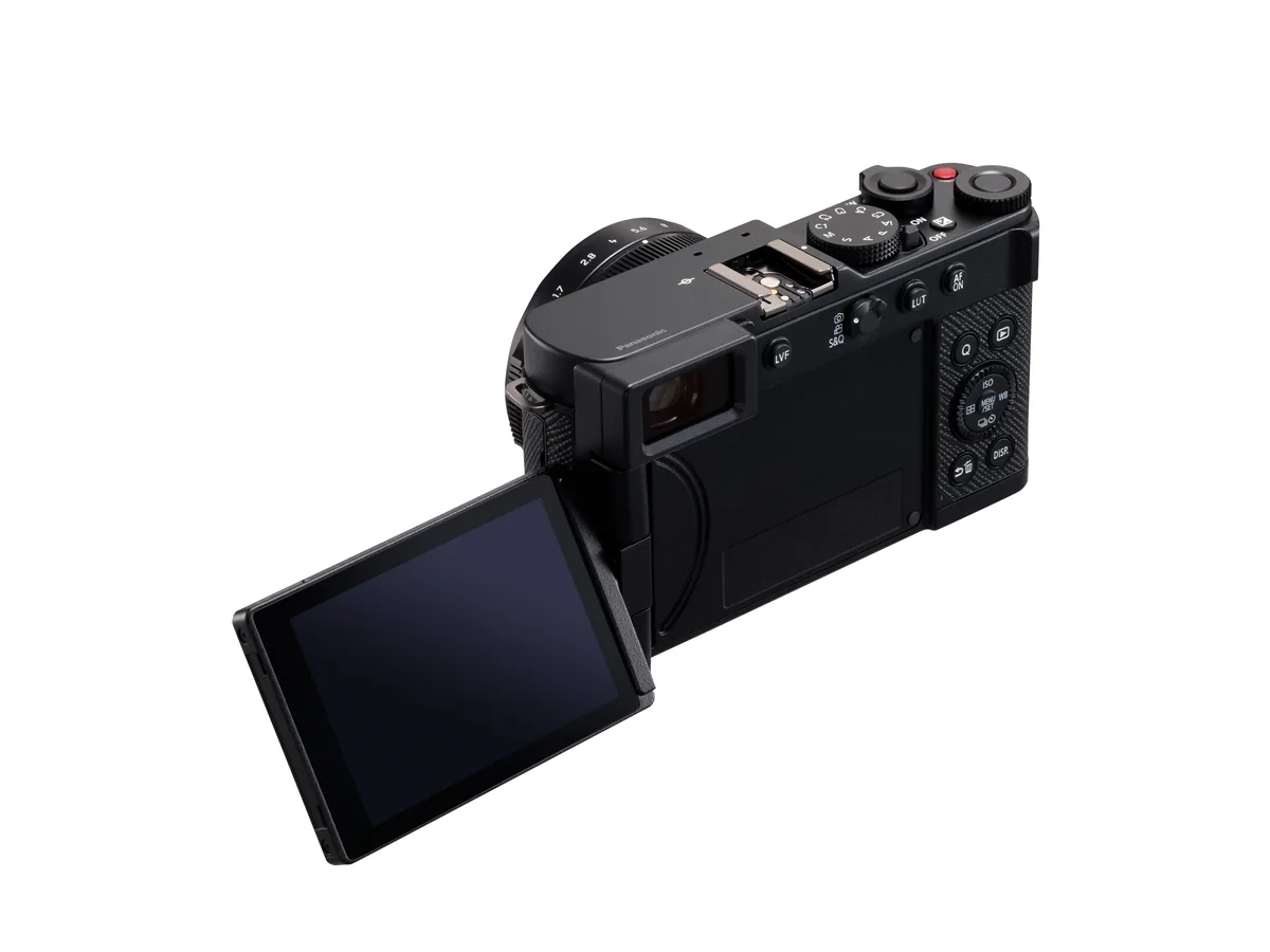 Rear view of the black LUMIX L10 with its articulated screen open.