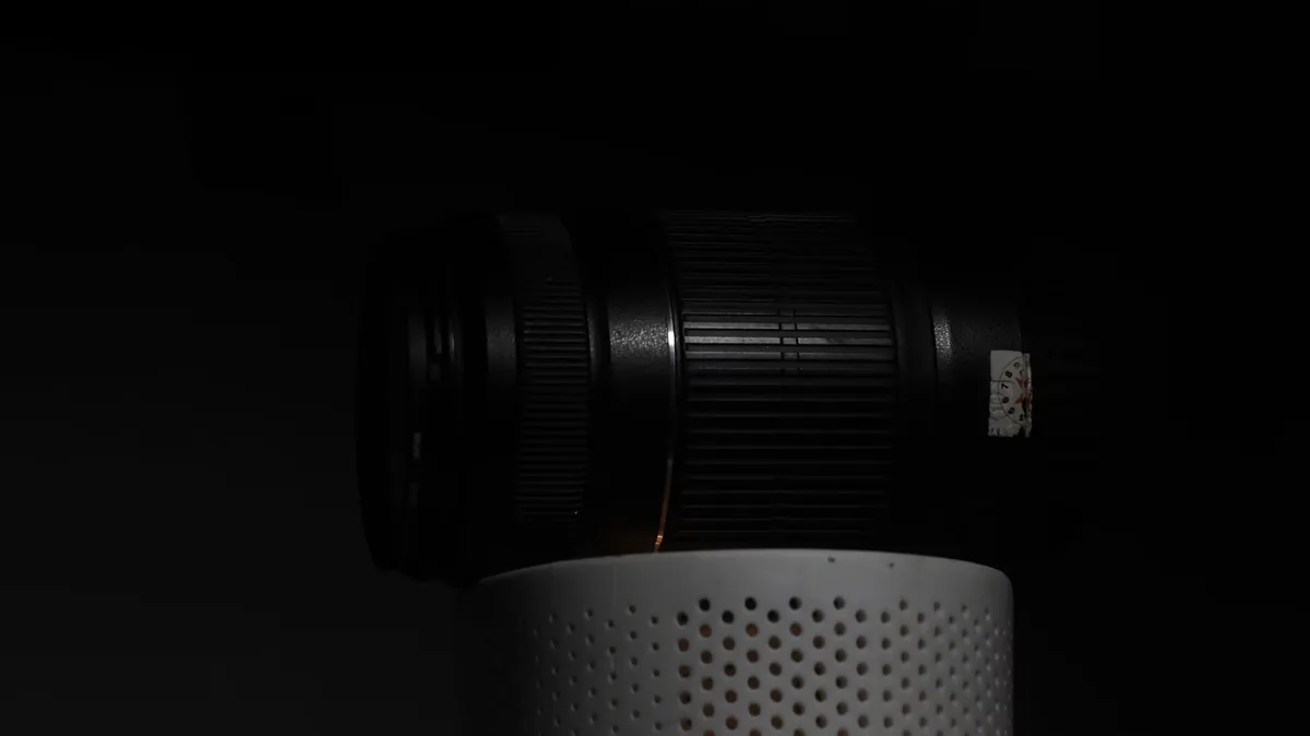 Detailed close-up of a modern camera lens