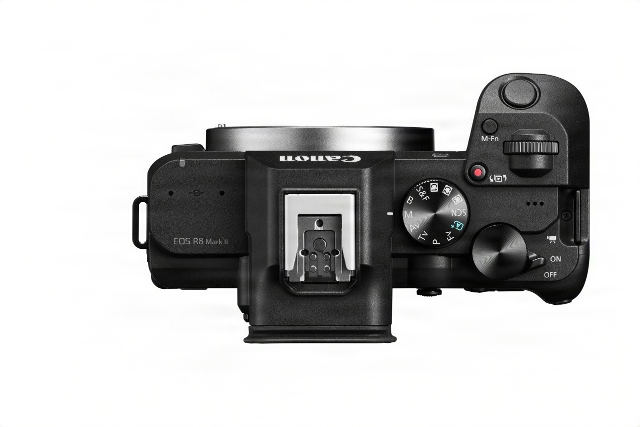 Official top view of the Canon EOS R8 Mark II showing model name and controls