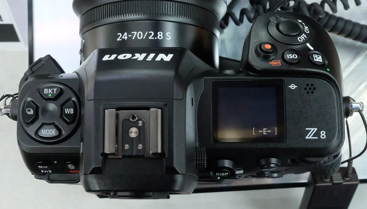 Top view of a Nikon Z8 showing its display, hot shoe and controls.