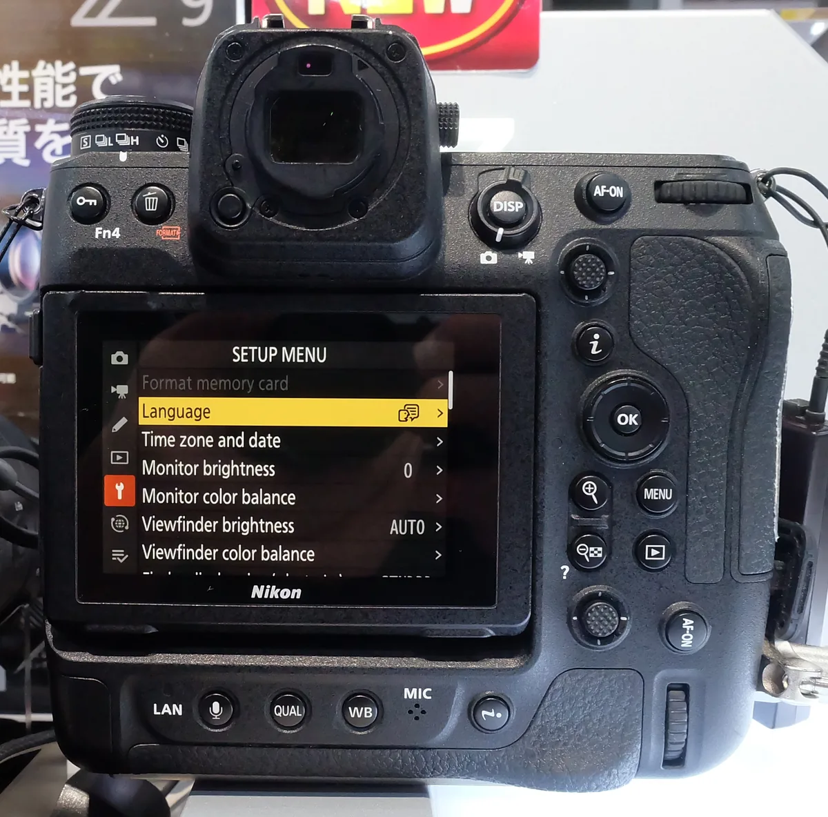 Rear of a Nikon Z9 with the setup menu open and Language selected.